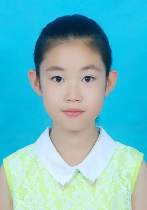 我的一寸证件照,我四年级了.