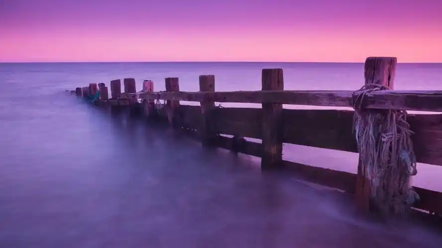 英国七姐妹郊野公园码头日落风景4k壁纸