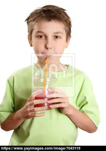 child drinking a juice