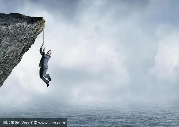 一个商人被吊在悬崖上的绳子上