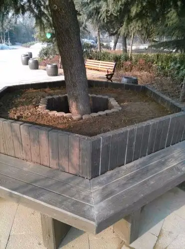 展开全部 园林景观小品水泥仿木树围