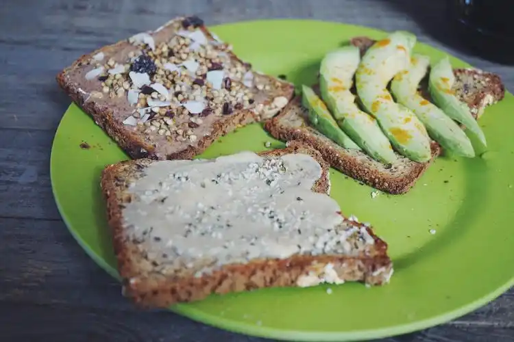 upgrade your toast: tasty tahini, almond cacao crunch & avocado