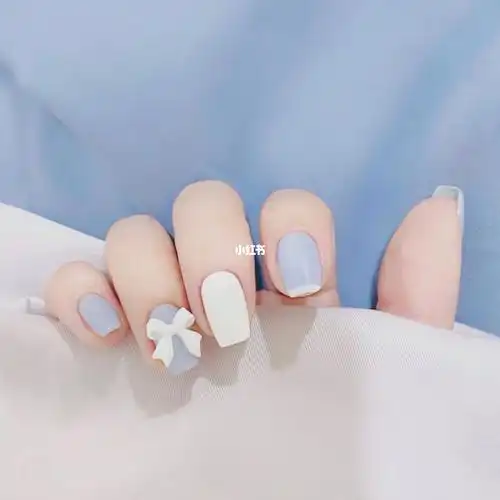 蓝色素雅甲蝴蝶结可爱高雅美甲