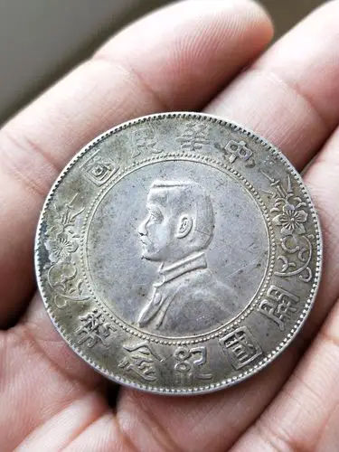 03民国好品带黄油光孙小头银元一枚