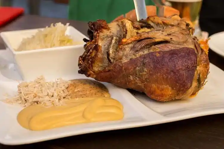 pork knuckle at pivovar narodini - prague food tour