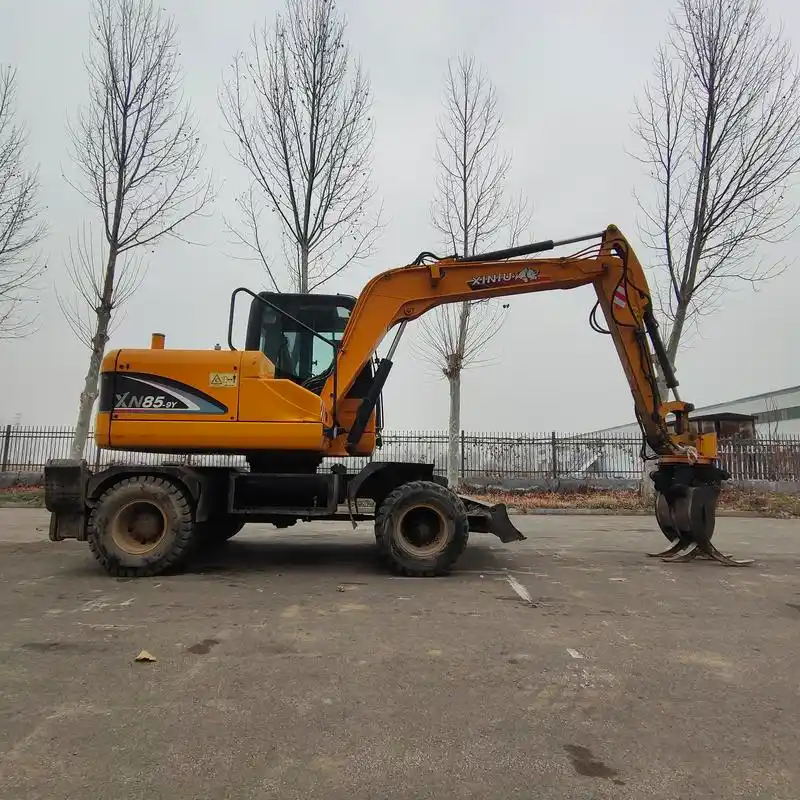 个人一手轮式抓木机图片 九成新抓包机 抓秸秆价格 济宁抓废料