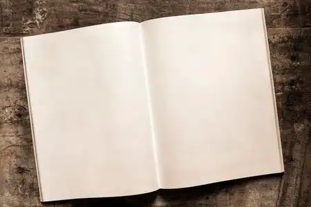 本打开的书的空白页上垃圾木材背景照片