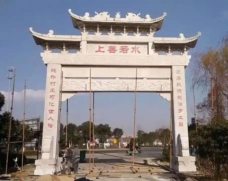 工艺品  嘉峪关四柱带瓦片石牌坊修补厂家   在农村门楼牌坊图片大全