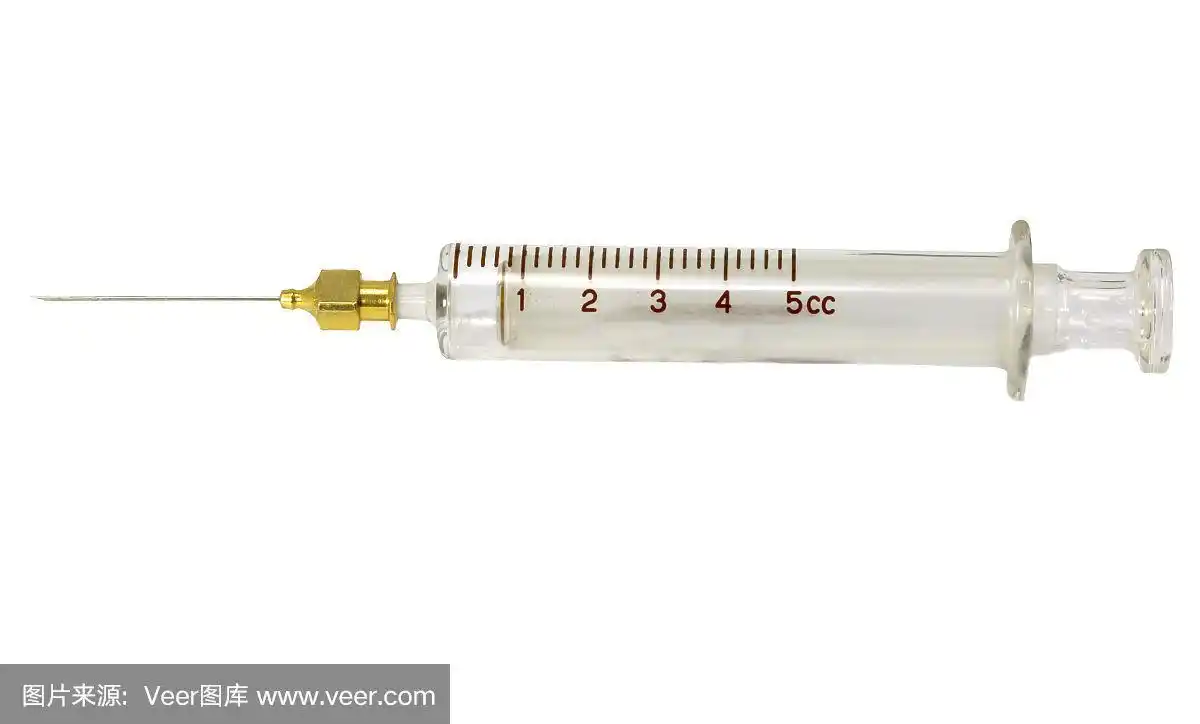 精致的复古医疗玻璃注射器与不锈钢针