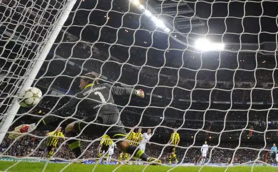 欧冠:佩佩厄齐尔救主 皇马2-2多特蒙德