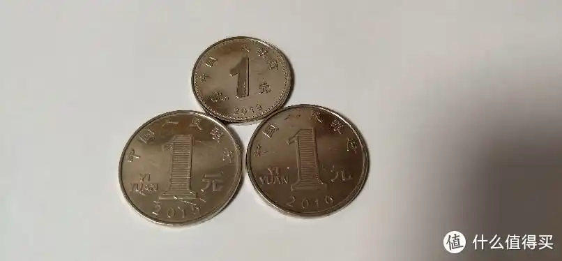 解忧杂货铺篇六十一新版2019年版的一元硬币用珠宝秤称量一下后重量