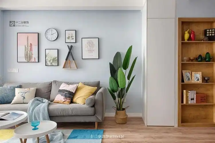 65平北欧风格沙发背景墙装修效果图
