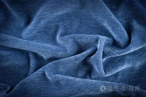 纺织和纹理的概念 —— 封闭的皱的织物背景.抽象的背景下,空模板.