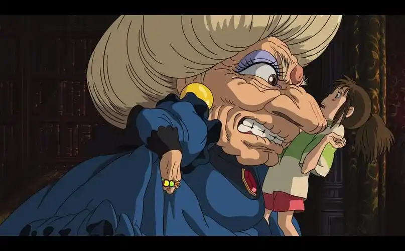 仗着身上带着金钱,大口吃起献给神明的食物,随后被汤婆婆变成猪作为