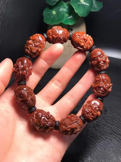 橄榄核雕新款立新十八罗汉做旧款