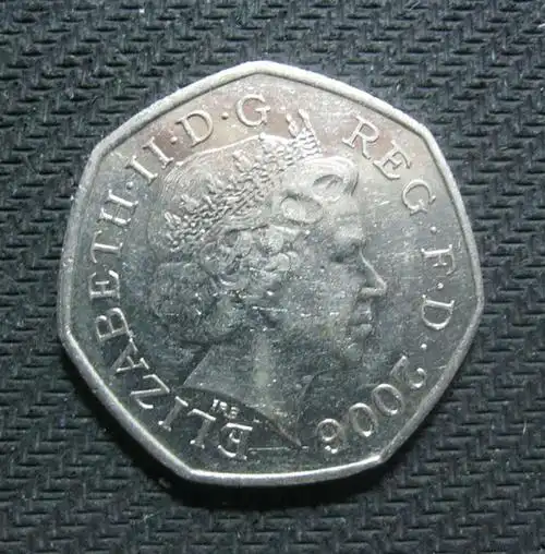 一便士等于多少人民币一男子地摊两块买的勺子