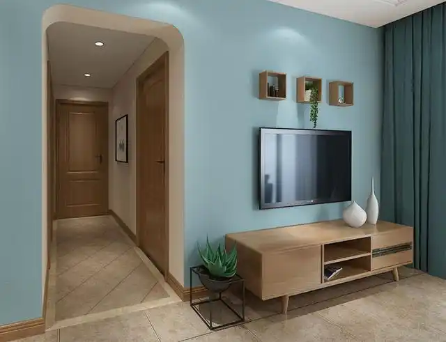 简洁的半圆弧形门洞过道设计,提升了整个起居室设计的品味,又对室内