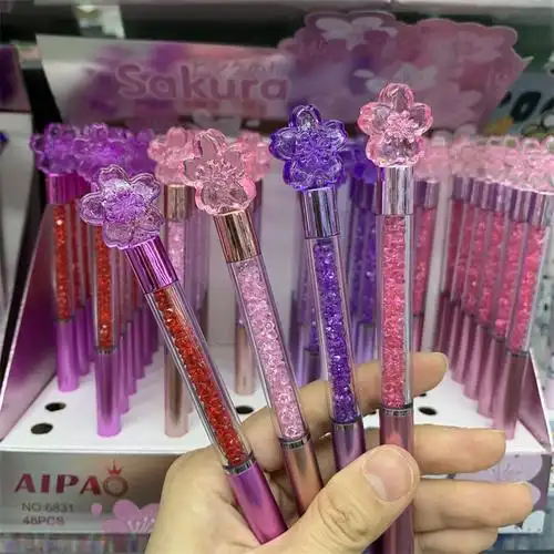 外贸跨境粉色唯美樱花造型钻石旋转圆珠笔樱花瓣写字笔学生礼品笔