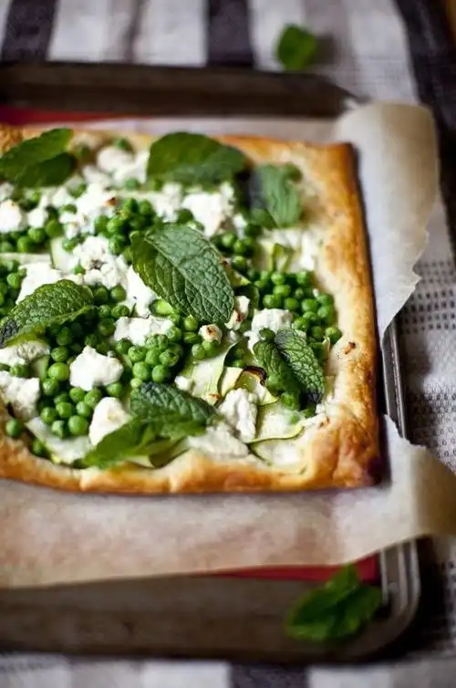 marinated feta, zucchini, pea and mint tarts.