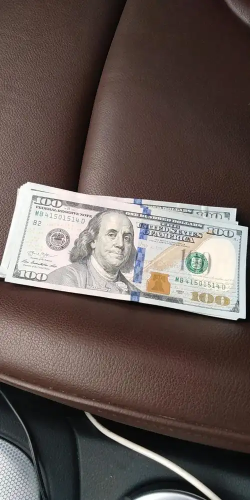 两万多换的美元才这点