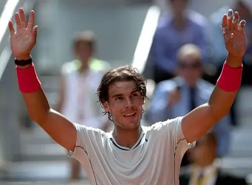 图文马德里赛纳达尔进八强纳达尔庆祝胜利