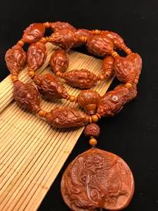 宋水官老师铁核大籽十八罗汉橄榄核雕文玩长串脖挂,尺寸约2.