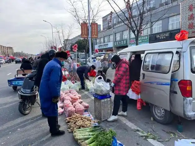 第一批回家过年的仪征人开始赶集了