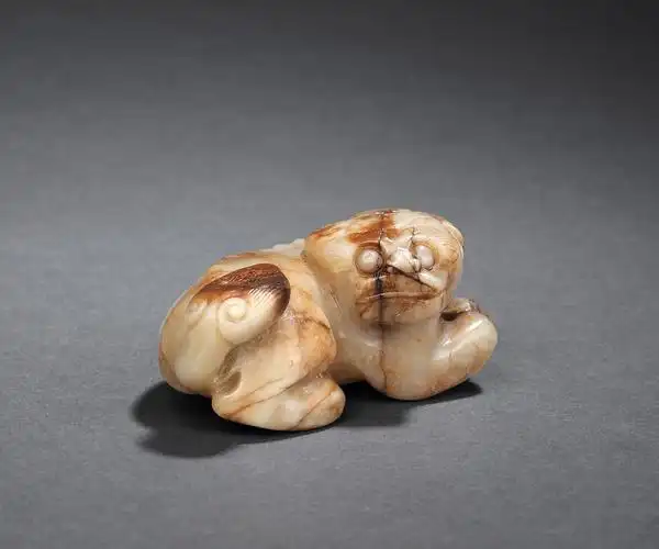 7506明白玉圆雕卧狮摆件