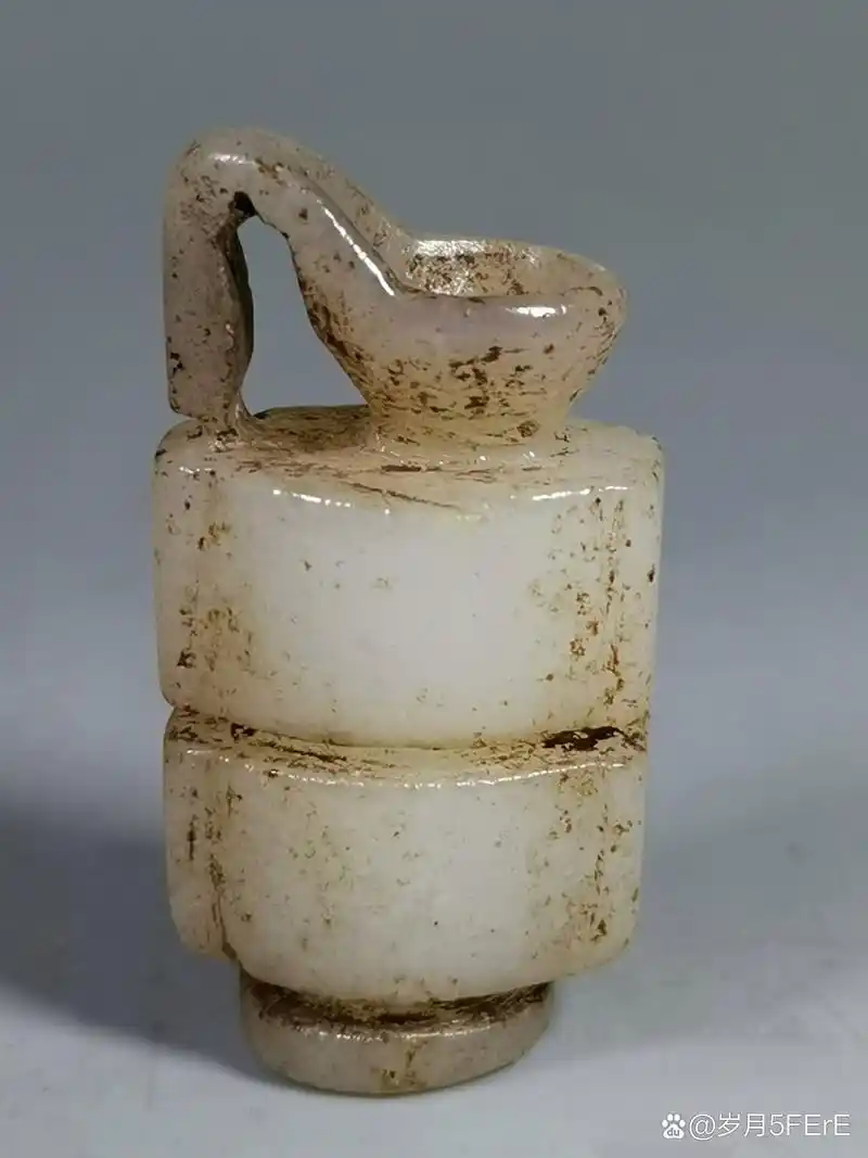 汉代白玉司南佩