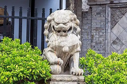 古代石狮子,山西平遥古县衙门前瑞兽石雕