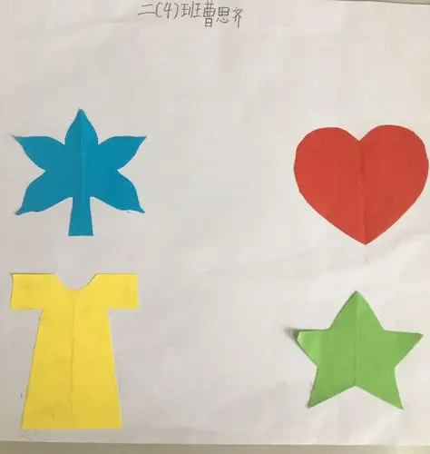 从二4班的小朋友的优秀作品中欣赏轴对称图形的美