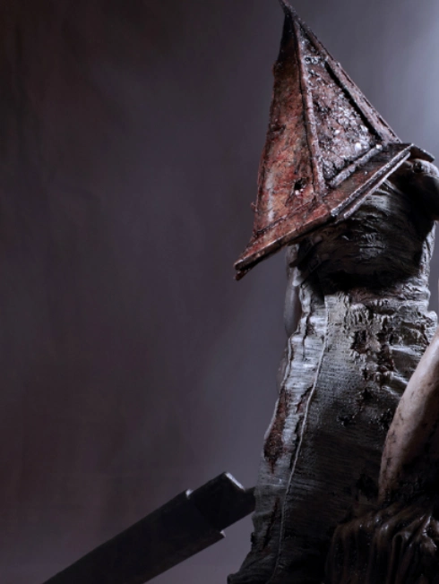 山泉君个人认为最经典就是《寂静岭》中的那个三角头屠夫了(貌似三角