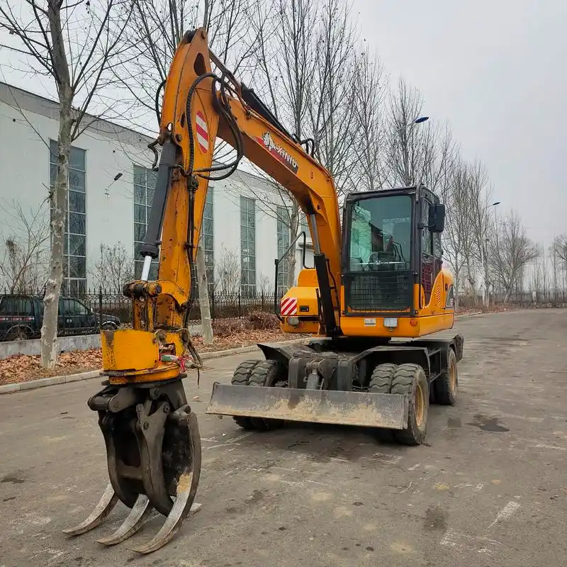 个人一手轮式抓木机图片 九成新抓包机 抓秸秆价格 济宁抓废料