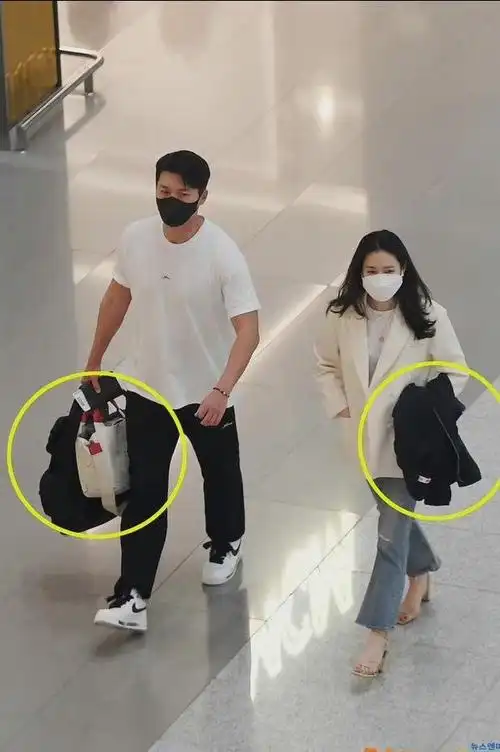 玄彬孙艺珍去美国度蜜月婚后依旧低调一前一后进入机场