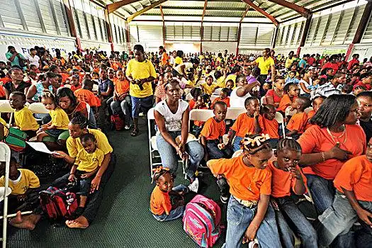 dominica,carib,territory,children,in,gym,hall,during,school,fair