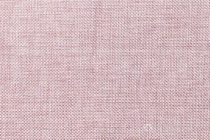 浅色珍珠背景的密织套袋面料,特写.结构的棕色布与自然纹理.布的背景.