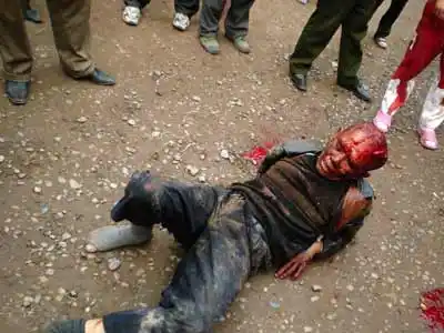 歹徒砍10人后杀向幼儿园 支书提扁担护儿童(图)