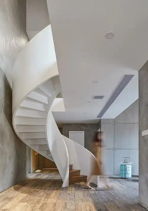 二层别墅挑空客厅旋转楼梯效果图