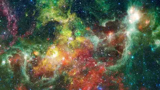 抽象明亮多彩的宇宙.星云夜空中繁星闪烁的彩虹色彩.多色外太空.