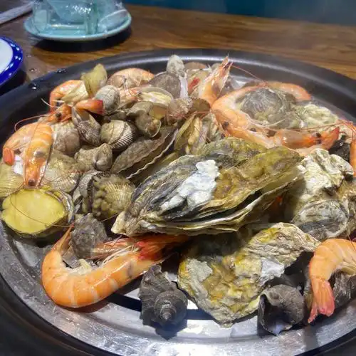 地地道道青岛海鲜:拾个海螺码头海鲜