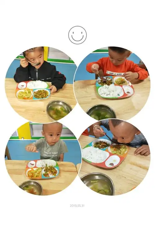 宝贝们开始自己动手吃饭喽,家里都是爸爸妈妈爷爷奶奶喂,上幼儿园了