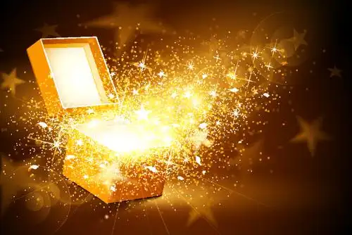 打开的宝箱里发出的金色闪耀光芒矢量素材