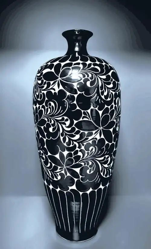 平定刻花瓷承千年古法展黑白古韵