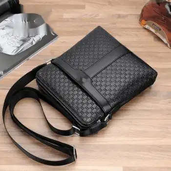 小米品牌男士包包单肩包挂包背包斜挎包牛皮休闲商务皮包跨包am88黑色