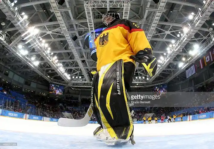 reacts after a play against russia during the womens ice hockey