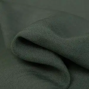 橄榄绿进口纯色透孔亚麻面料春夏新款垂坠亲肤高档西装外套布料