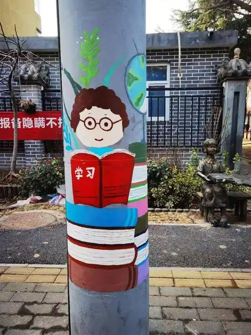 河南鹤壁城区美化好创意电线杆上彩绘做文章