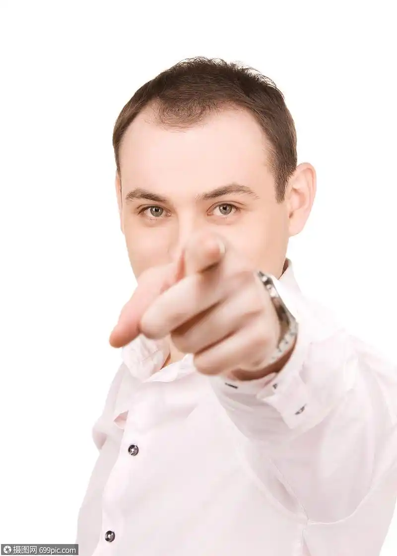 吸引人的商人指着他的手指的照片