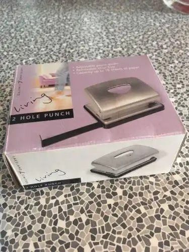 2 hole punch. new in box. lakeland. adjustable paper guide.